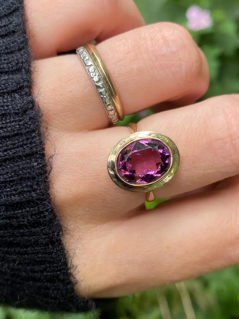 gold and purple paste ring