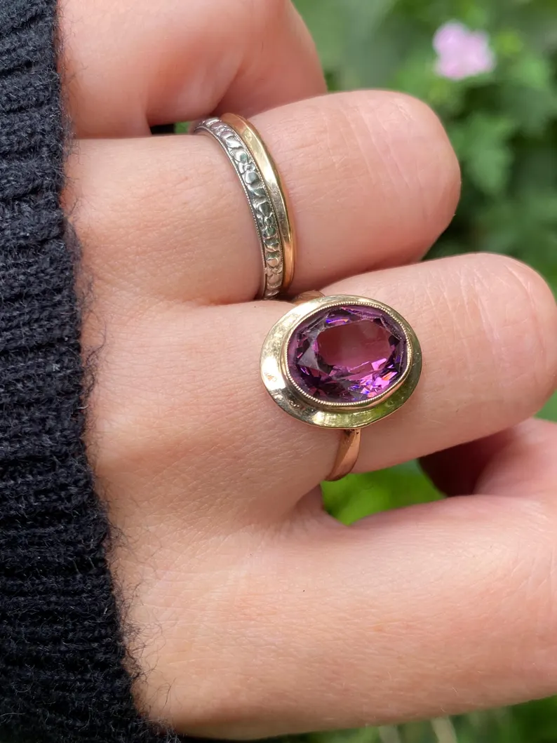 gold and purple paste ring